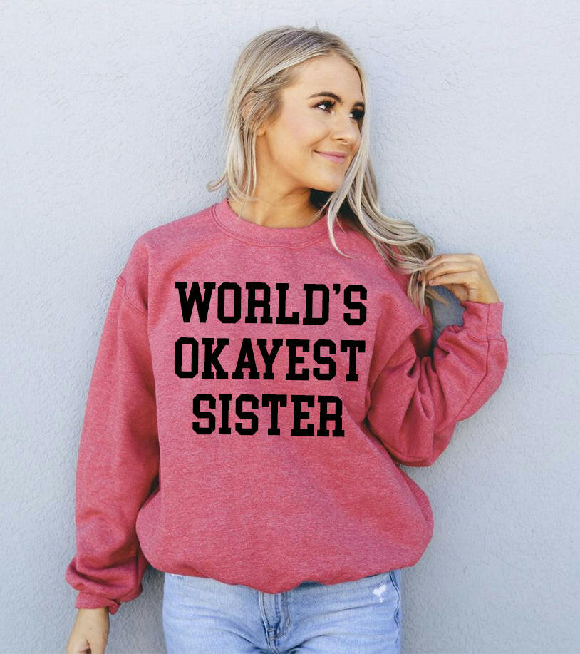 Collection of World's Okayest Sister Sweatshirt in a gallery layout